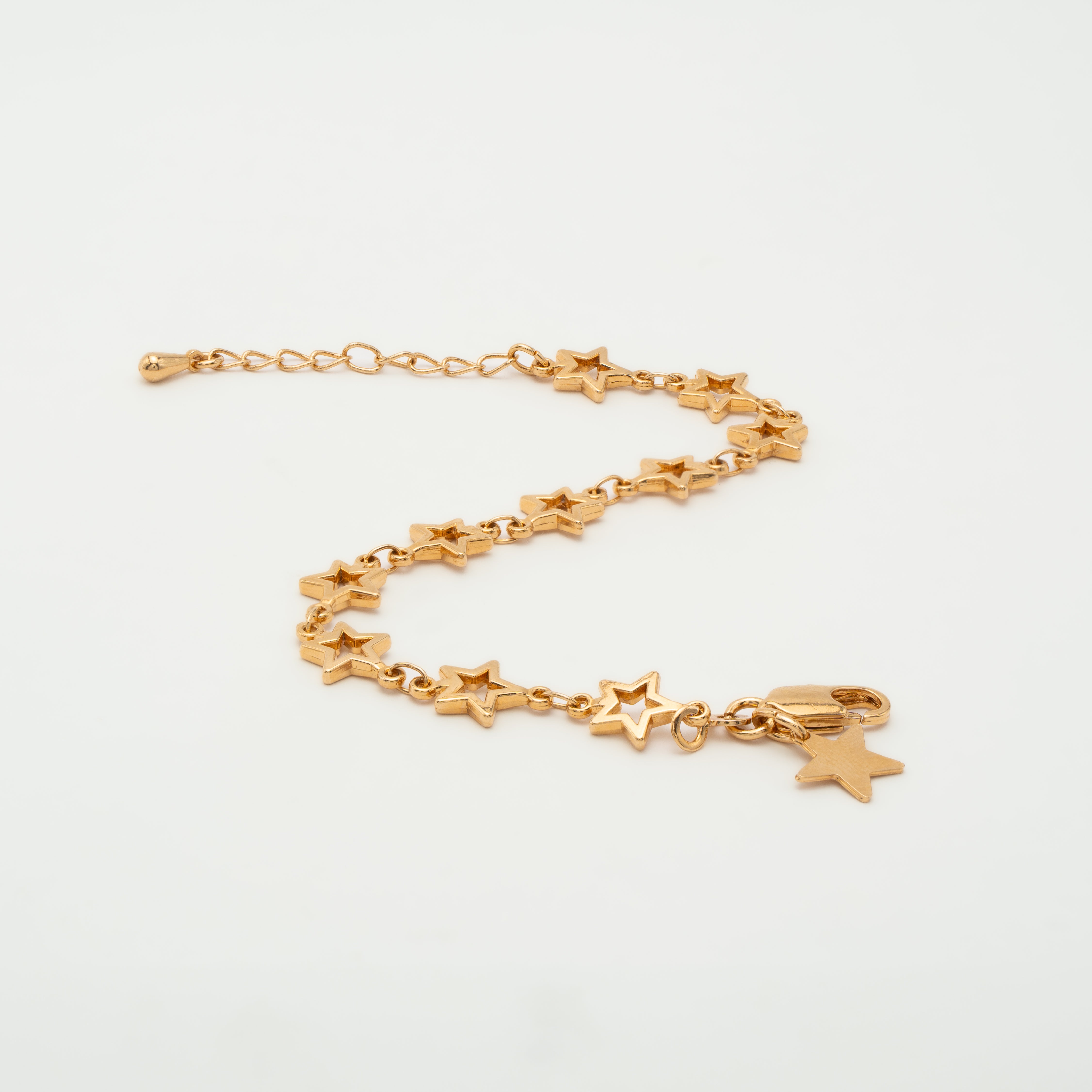 Pulsera cadena estrellas silueta - Detalle - Joyeria banada en oro Shabama
