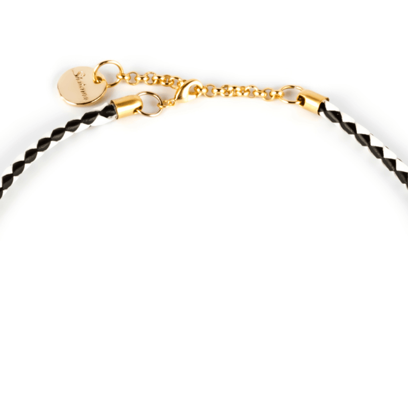 Trenc Luxe, collar de cuero italiano con erizo bañado en oro.