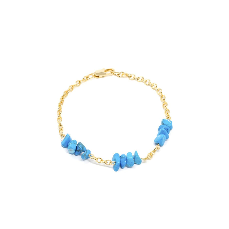 Varanasi, pulsera bañada en oro con piedras turquesas.